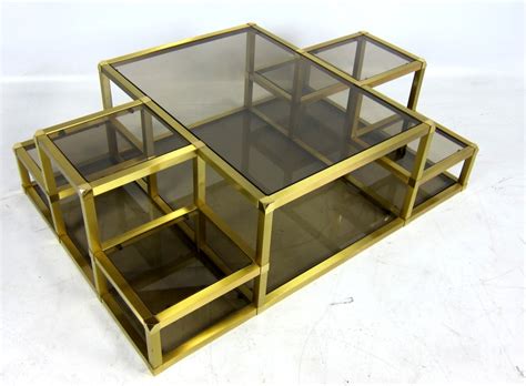 I ended up adding some brass accents for a modern twist and i am super happy i did! Large Multi-Level Brass Cocktail Table at 1stdibs