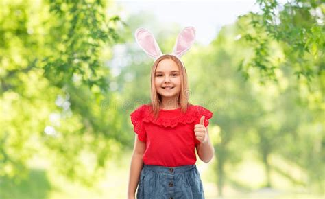 Girl Wearing Easter Bunny Ears Showing Thumbs Up Stock Image Image Of