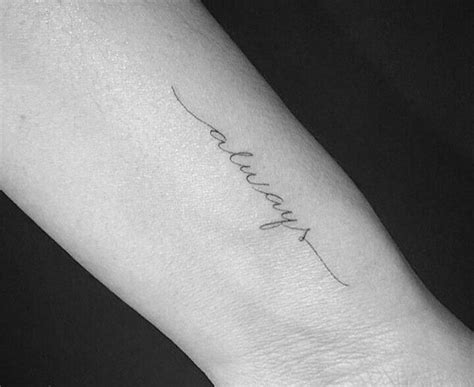 Choosing to get a name tattoo is a big deal depending on whose name is being placed on the body. Dainty Cursive Tattoo