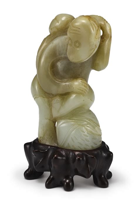 (#485) A PALE CELADON JADE FIGURE OF A MONKEY MING – EARLY QING DYNASTY