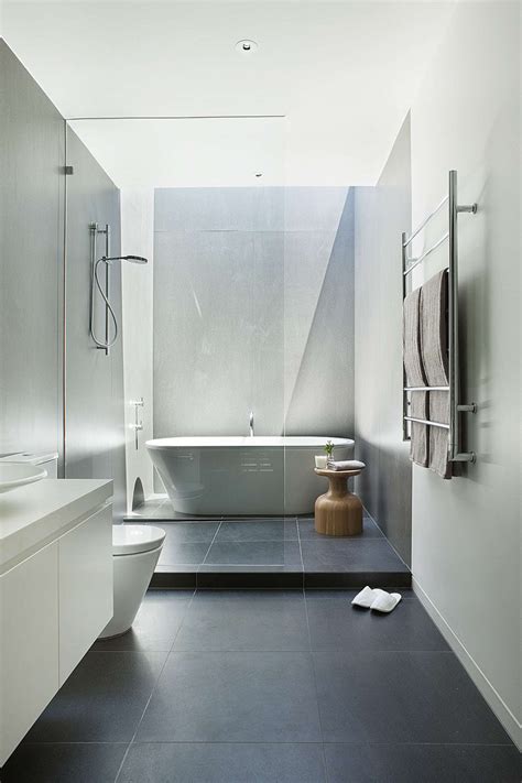 Some floor tiles can be too heavy to adhere safely to vertical surfaces, while wall tiles. Bathroom Tile Idea - Use Large Tiles On The Floor And ...