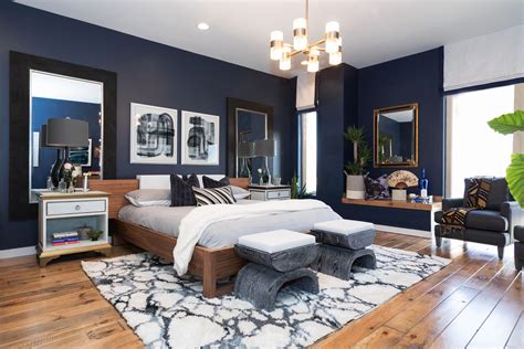 This Master Bedroom Has Modern Art A Dark Wall Color A Shag Rug And