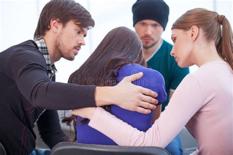 Group Of People Comforting Upset Woman Stock Photo Image Of Project