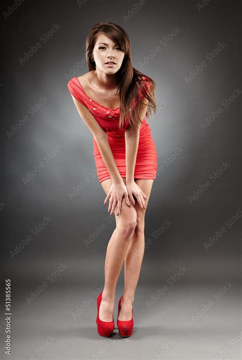 Beautiful Woman Posing With Hands On Her Knees Stock Photo Adobe Stock