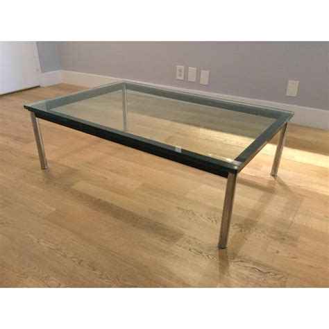 Designed by le corbusier in 1924 manufactured by cassina the table has a thick glass top which rests on a mat black frame with. Le Corbusier Lc10-P Rectangular Coffee Table | Chairish