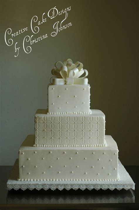 A laconic neutral square wedding cake topped with fresh fruits and berries for a modern wedding. Simple and elegant | Buttercream square Wedding Cake ...