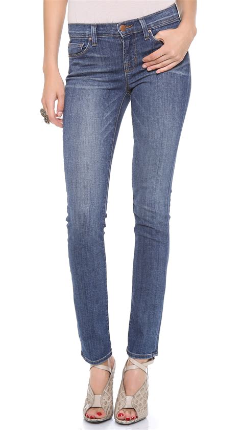 J Brand 811 Mid Rise Skinny Jeans In Blue Skylar Lyst