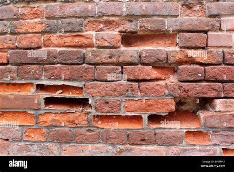 Old Soft Red Brick Wall Showing Signs Of Weathering And Wear Stock