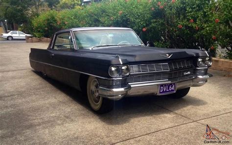 The first car to bear the name was the 1949 coupe de ville. 1964 Cadillac Coupe DE Ville