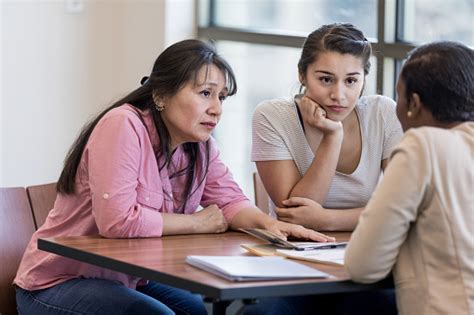 We are holding a collection this sunday at our home game so. Women Meeting With Bank Employee Stock Photo - Download ...