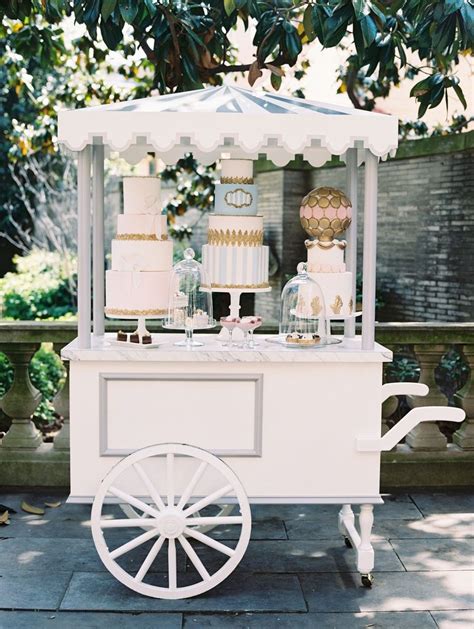 Wedding Reception Paris Theme Dessert Pastry Cart With Three Cakes And Macaron Sphere With