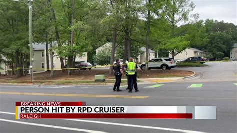 pedestrian hospitalized after being hit by north carolina police car