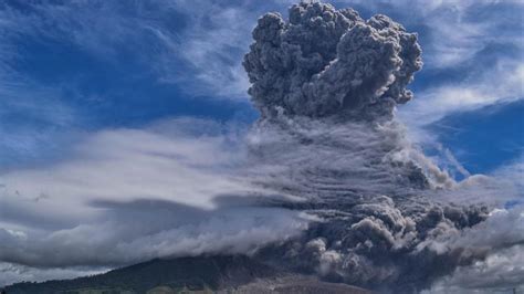 Photos Indonesias Volcano Mount Sinabung Erupts Spewing Ash Miles