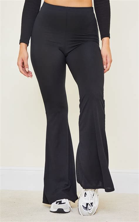 Tall Black Ribbed High Waist Flared Trousers Prettylittlething