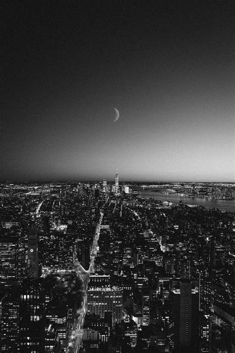 Grayscale Of City Buildings During Night Time Hd Phone Wallpaper Peakpx