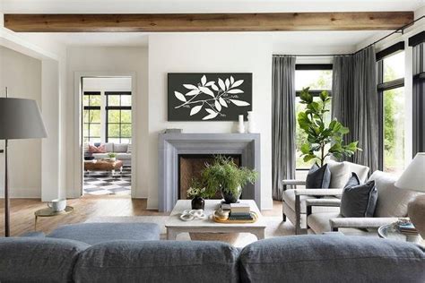 Gorgeous Gray Living Room Boasts A Charcoal Gray Sofa Placed On A Light