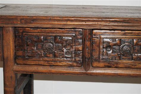 Shop hand carved wood dressers on houzz. Antique Chinese Elmwood Table with Hand-Carved Drawers ...