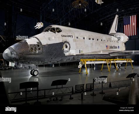 Space Shuttle Discovery And The Canadarm Or Shuttle Remote Manipulator Arm On Display At The