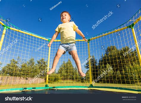 Little Boy Jumping On Trampoline Stock Photo 482698039 Shutterstock