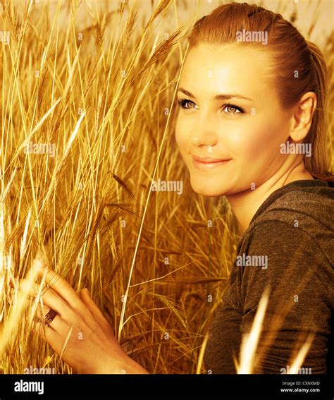 Picture Of Sweet Lovely Female Enjoying Freedom On Golden Wheat Field Closeup Portrait Of