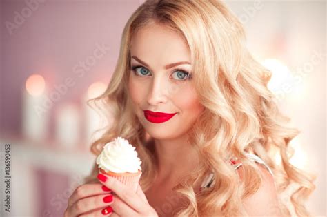 Smiling Blonde Woman 20 24 Year Old Holding Tasty Cupcake Over Lights