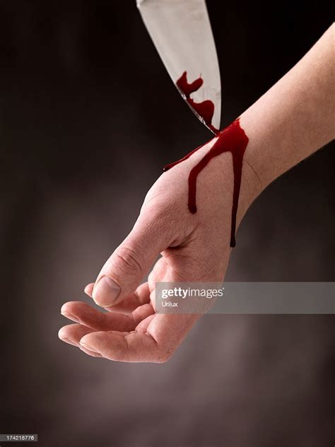Suicide Attempt Guy Cutting Veins High-Res Stock Photo - Getty Images