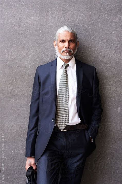 Elegant Businessman Against Grey Background By Guille Faingold For Stocksy United Free Stock