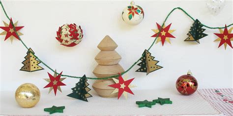 Comment fabriquer une guirlande de Noël avec des sapins en papier Marie Claire