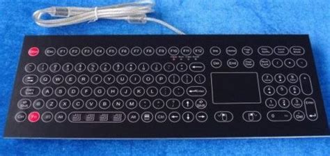 A key being pressed on a computer keyboard. Trivedi Tech