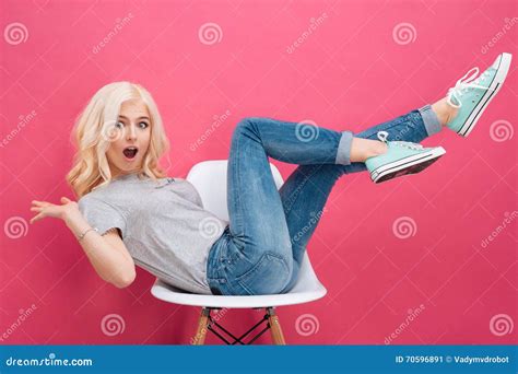 Woman Sitting On The Chair With Raised Legs Stock Image Image Of