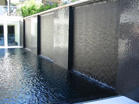 waterfall | Water feature wall, Backyard pool designs, Pool houses