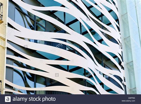 Does facade design pattern inherits the concept of facade from architecture? Modern architecture, facade, Barcelona, Spain Stock Photo ...
