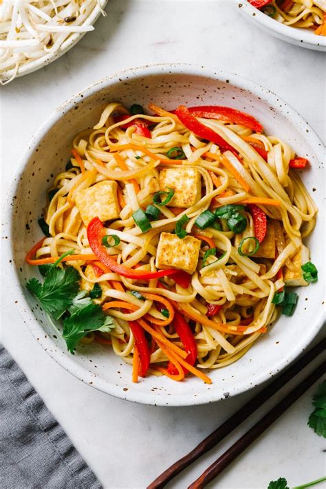 While noodles are cooking, heat olive oil in large skillet or wok over medium high heat. Vegetable Lo Mein with Crispy Tofu - 30 Minute Easy Vegan ...