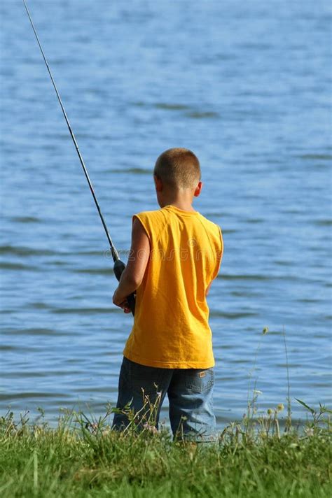 Young Boy Fishing Stock Photo Image Of Water Spool Pond 1107352