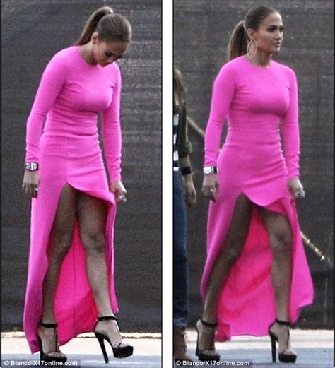 Jennifer Lopez Shows Off Her Toned Legs In A Hot Pink Skin Tight Dress With A Very Daring Thigh