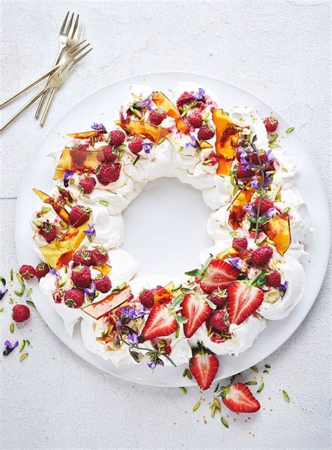 The meringue provides an enticing layer beneath the cream and crimson raspberries. Transform meringues into this stunning Christmas dessert ...