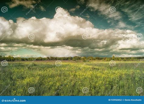 Beautiful Cumulus Clouds Over Meadows And Fields In The Valley Stock
