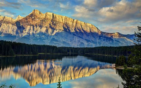 Reflection Of The Mountains In A Lake 4k Ultra Hd Wallpaper