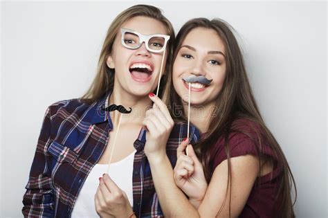 Lifestyle And People Concept Two Stylish Hipster Girls Best Friends Ready For Party Over White