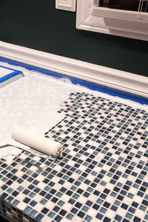 There are two important components to painting ceramic tile—preparing the surface properly and. How to Paint Tile Countertops and our Modern Bathroom ...