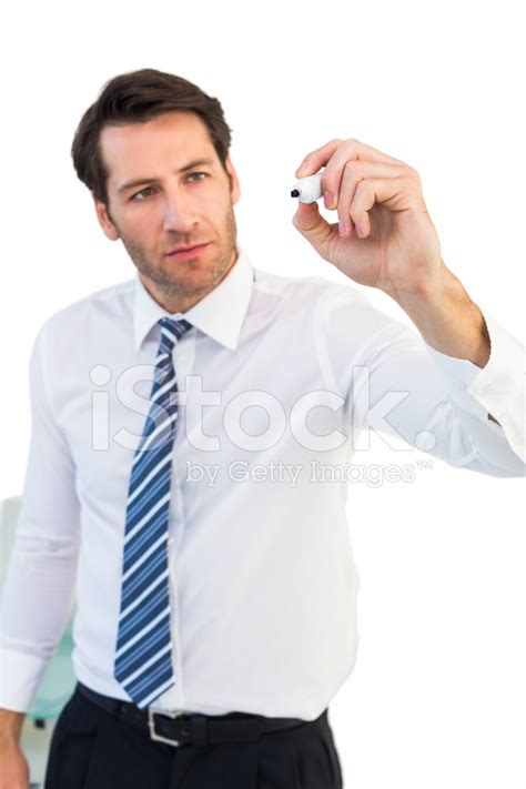 Focused Businessman Writing With Marker Stock Photo Royalty Free