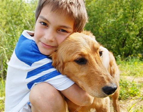 Boy Hugging His Dog Stock Photo By ©simply 3270740