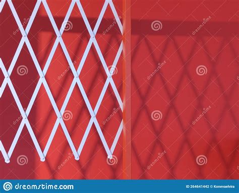 Reflection Of White Bars On A Red Wall Geometric Shadows On The Wall