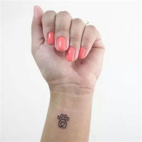 What makes this paw unique is the adorable heart on one of the toes.. Mini Heart Paw Print Wrist Tattoo | Tattoos, Mini tattoos ...