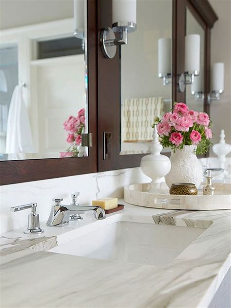 Make your bathroom the cleanest — and tidiest — room in the house with these easy and genius storage ideas. Declutter Your Bathroom | Countertop decor, Bathroom ...