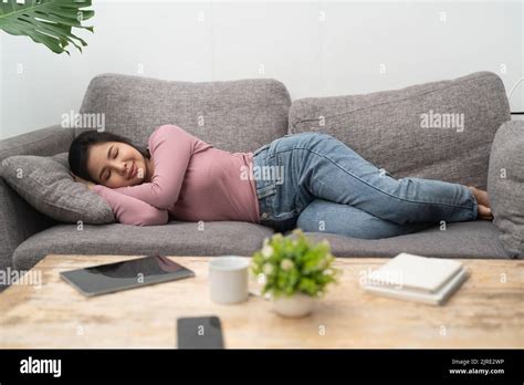 Asian Girl Sleeping On Sofa Hi Res Stock Photography And Images Alamy