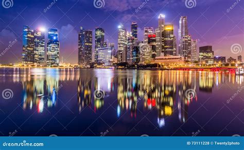 The Bright Lights Of Singapore City As Seen From Across The Marina
