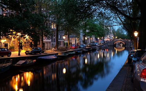 amsterdam at night river reflections hd wallpaper
