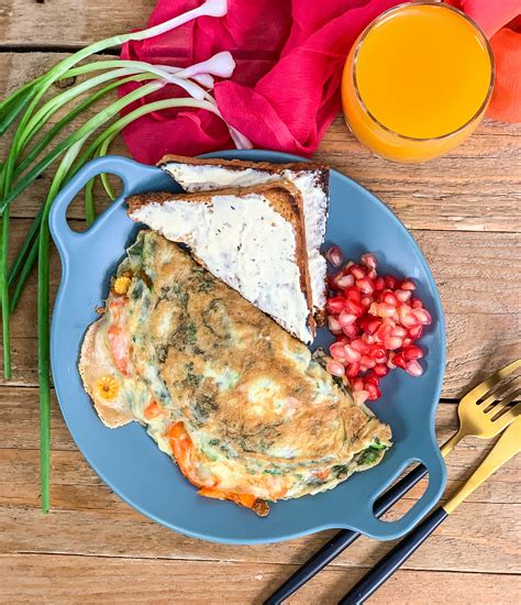 Omelette is eaten across the world so it is made with so many variations. Cheesy Masala Omelette Recipe With Roasted Vegetables by ...