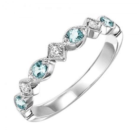 10k White Gold Diamond And Blue Topaz Birthstone Ring Mullen Brothers